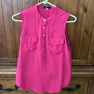 Hot Pink sleeveless blouse with two pockets in front